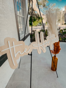 layered wooden last name wedding sign